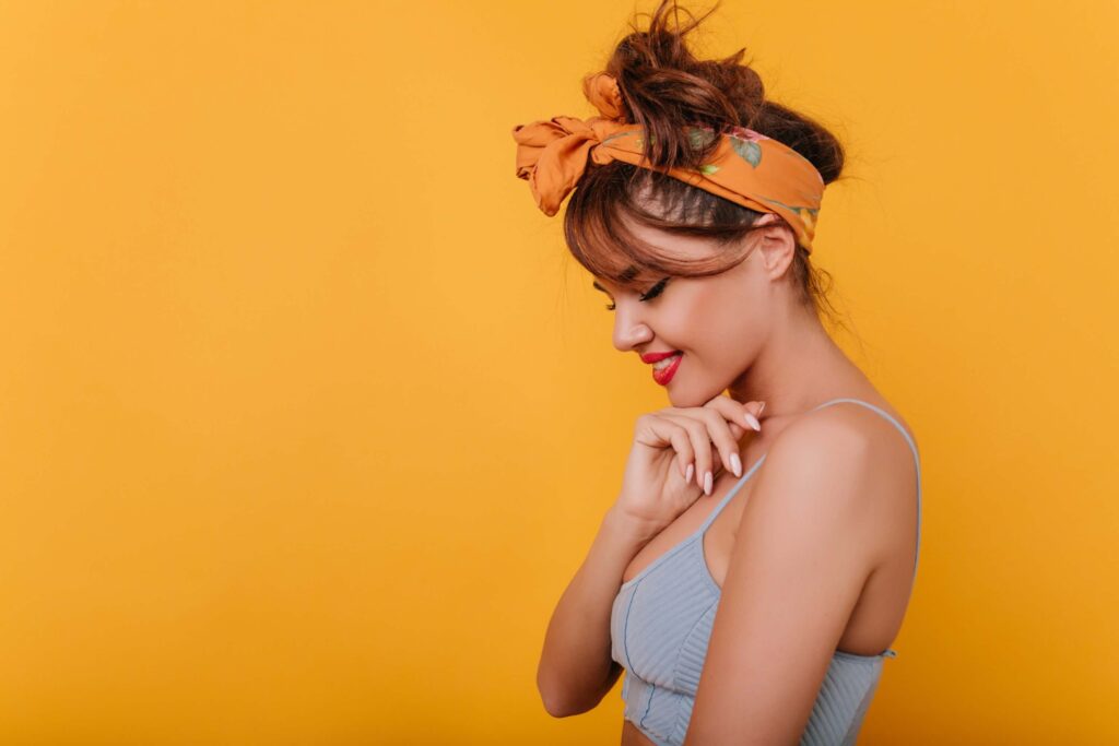 Woman wearing a stylish scarf or headband